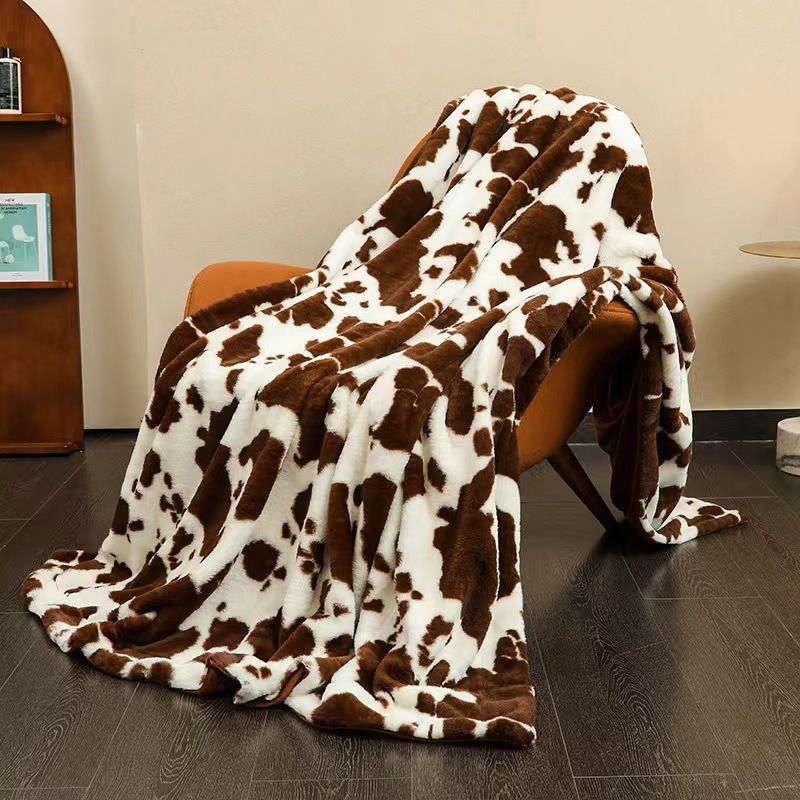 Cobertor com estampa de vaca